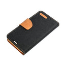 Schick und sicher: Die CANVAS Book Case Schutzhülle für das iPhone 14 in Schwarz mit edlem Lederakzent bietet stilvollen Schutz für Ihr Smartphone. Mit praktischer Aufklappfunktion und robustem Material, ideal für den Alltagsgebrauch.