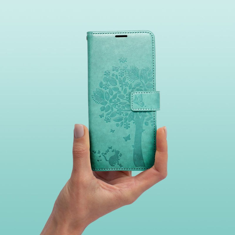 Diese stilvolle grüne Schutzhülle für das Apple iPhone 13 ist nicht nur ein eleganter Blickfang, sondern bietet auch zuverlässigen Schutz für Ihr Smartphone. Das auffällige Design mit floralen Mustern verleiht Ihrem Gerät eine persönliche Note, während das robuste Material vor Kratzern und Stößen schützt.