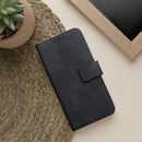 Entdecken Sie das TENDER Holster für Ihr Samsung Galaxy S24! Schützen Sie Ihr Smartphone stilvoll mit einem weichen Material und praktischem Magnetverschluss. Drei Innenfächer bieten Platz für Dokumente. Einfach in TV-Ständer-Position falten. Ideal für Alltag und unterwegs!