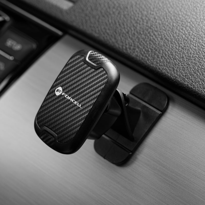 Die Carbon magnetic car holder von FORCELL sorgt mit ihrem starken Magnet für einen sicheren Halt Ihres Smartphones direkt am Armaturenbrett Ihres Fahrzeugs. Mit ihrem eleganten Carbonfaser-Design fügt sie sich nahtlos in das moderne Auto-Interieur ein.
