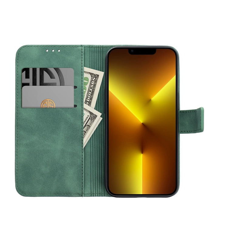 Die elegante grüne Handytasche für das Samsung Galaxy A14 4G/A14 5G bietet zuverlässigen Schutz und Funktionalität. Ausgestattet mit einer praktischen Standfunktion und Fächern für Karten, verbindet dieses Accessoire Sicherheit mit Stil.