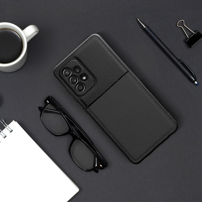 Schützen Sie Ihr Samsung Galaxy A16 5G stilvoll mit dieser eleganten, schwarzen Handytasche. Die strukturierte Oberfläche verbessert den Griff, während das robuste Material vor Stößen und Kratzern bewahrt.